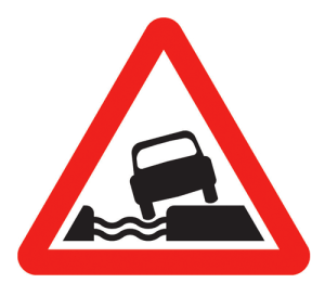 English Road Sign: Water Course Beside Road